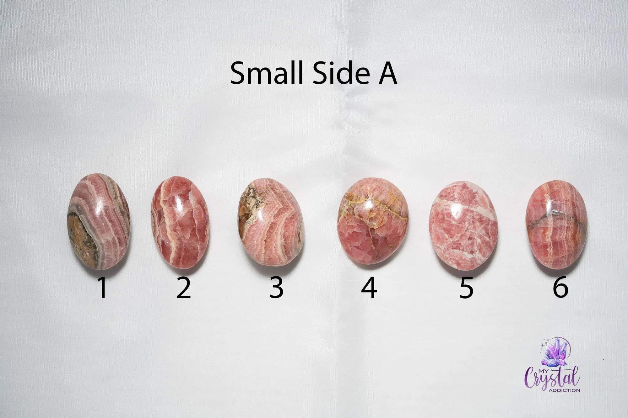Rhodochrosite Palm Stone - Puffy - My Crystal Addiction