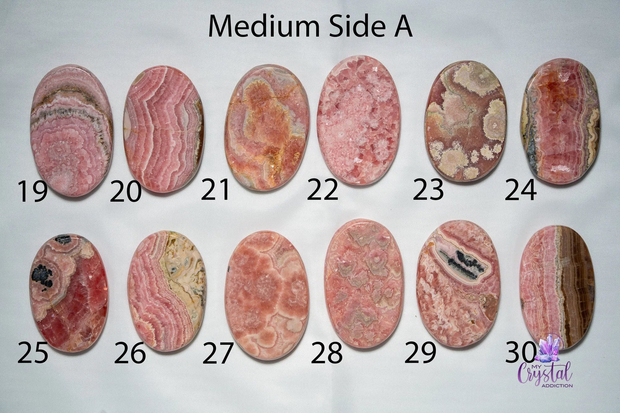 Rhodochrosite Palm Stone - My Crystal Addiction