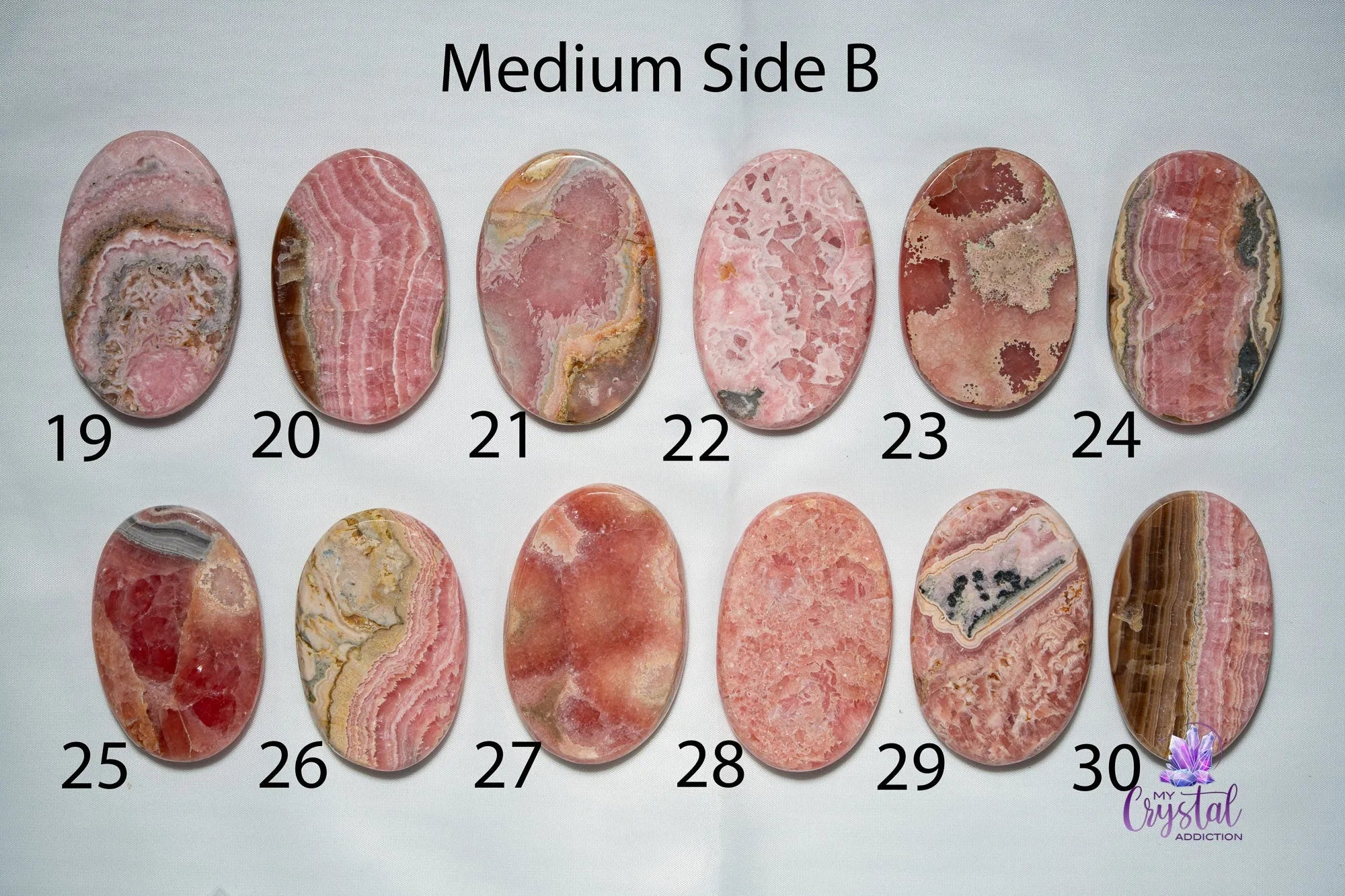 Rhodochrosite Palm Stone - My Crystal Addiction