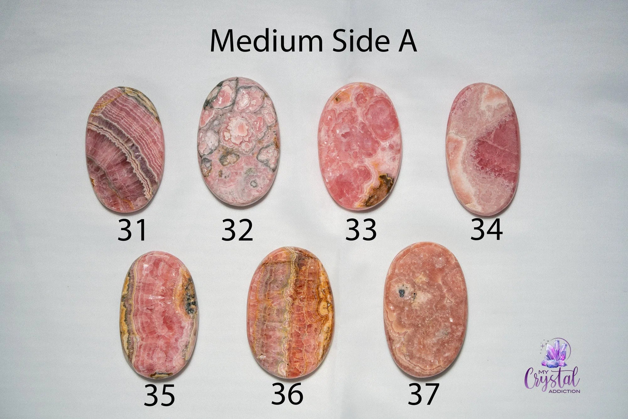 Rhodochrosite Palm Stone - My Crystal Addiction
