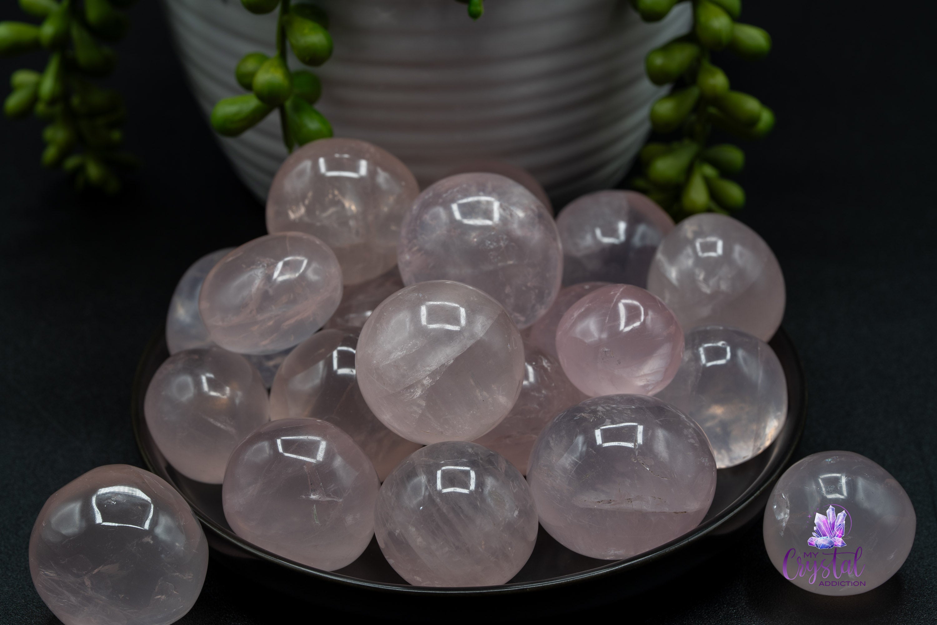Rose Quartz Tumbles on a plate