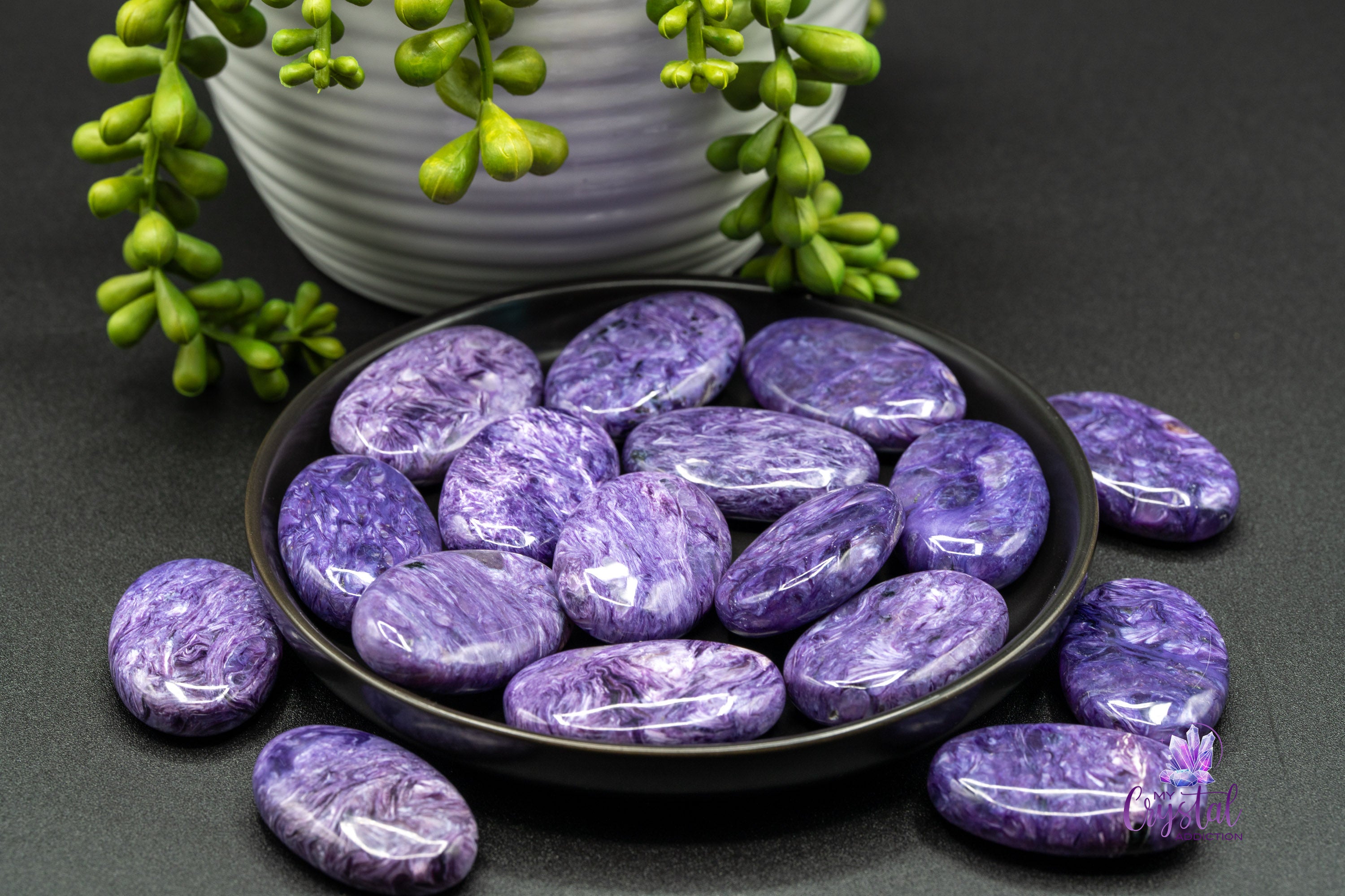 Product photo 1 of Charoite Mini Palm - Grade AAA - Crown Chakra