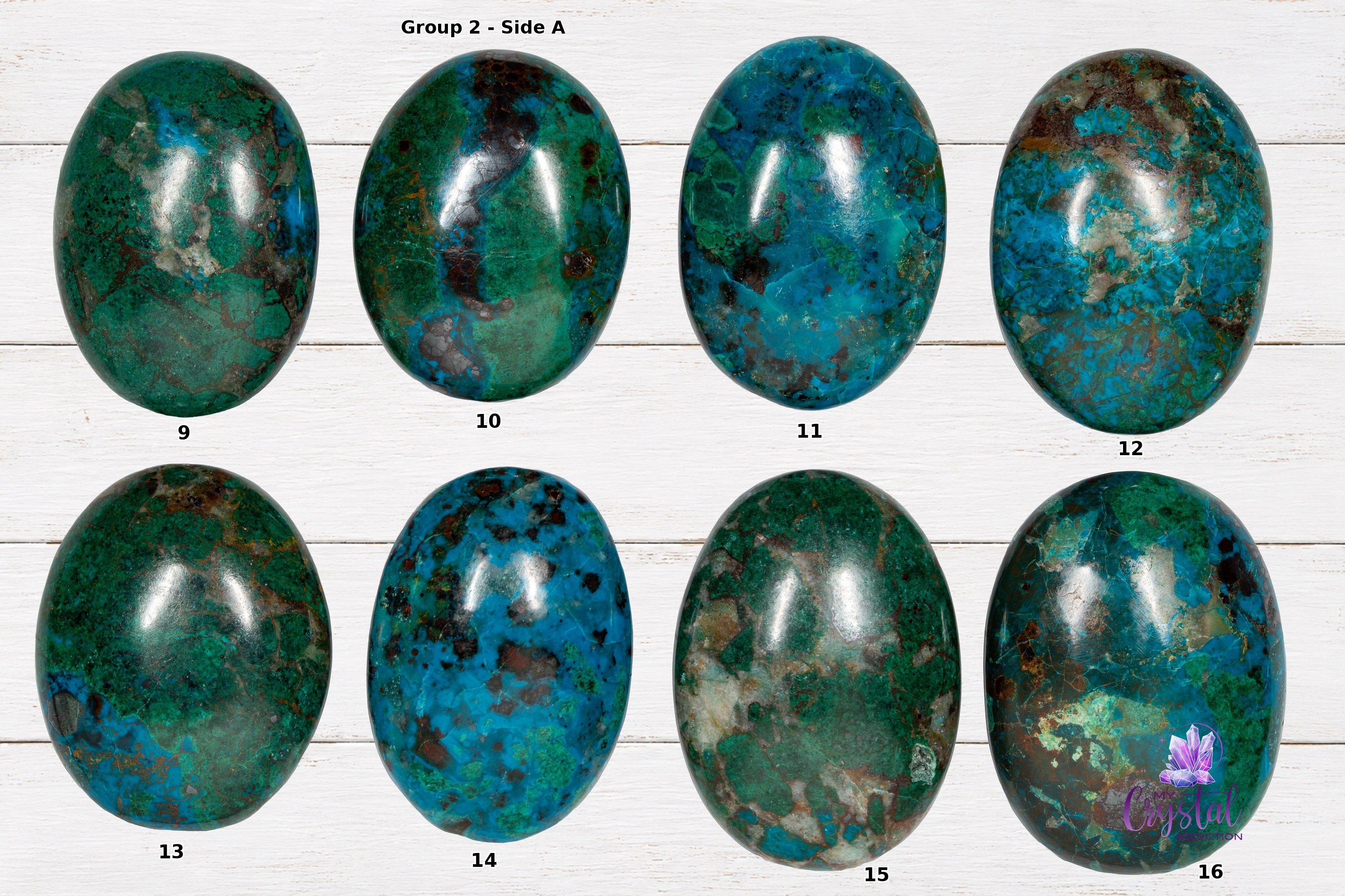 Front sides of chrysocolla palm stones numbered 9 through 16 on a white wood background.
