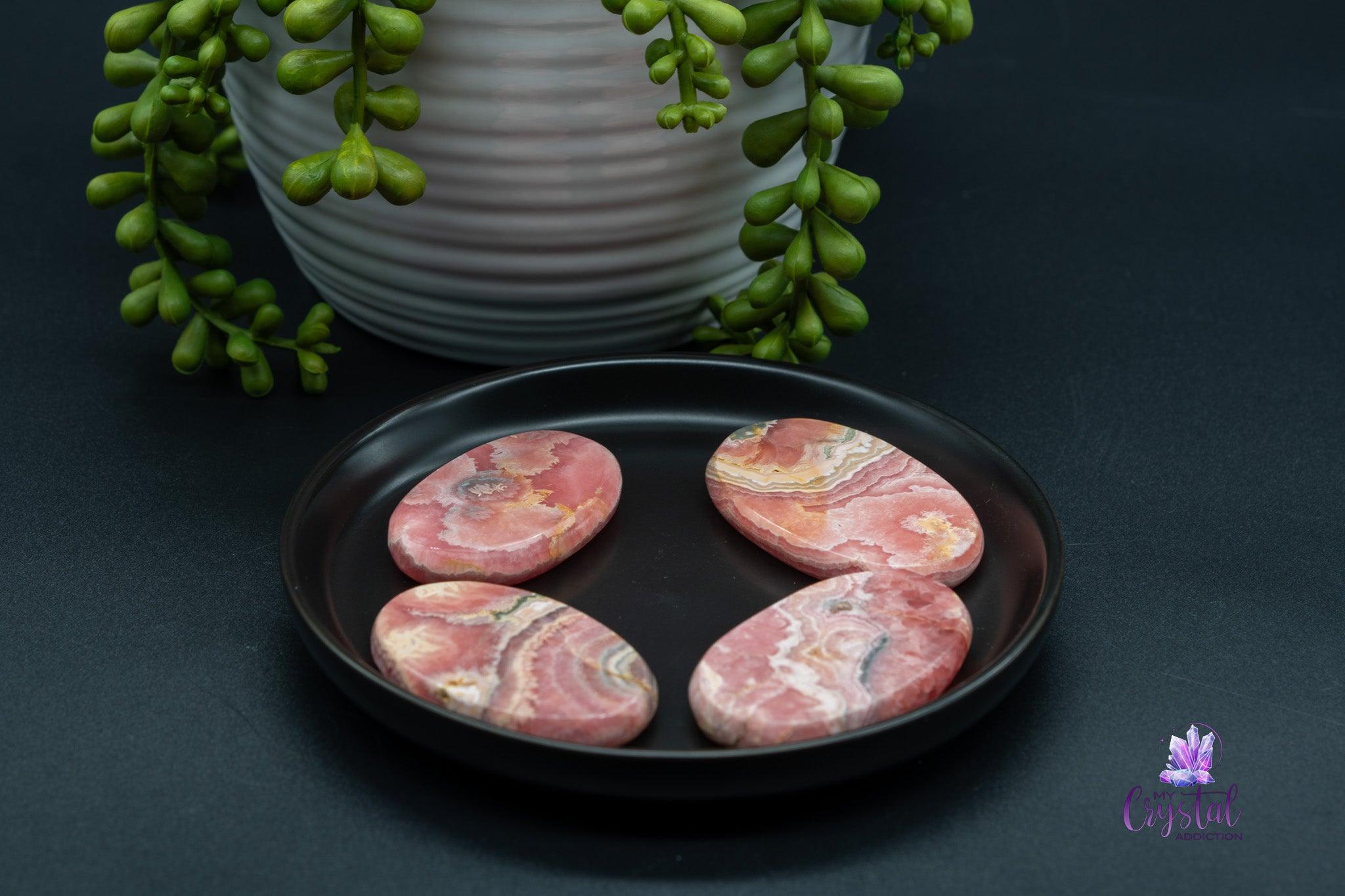 Rhodochrosite Palm Stone - My Crystal Addiction