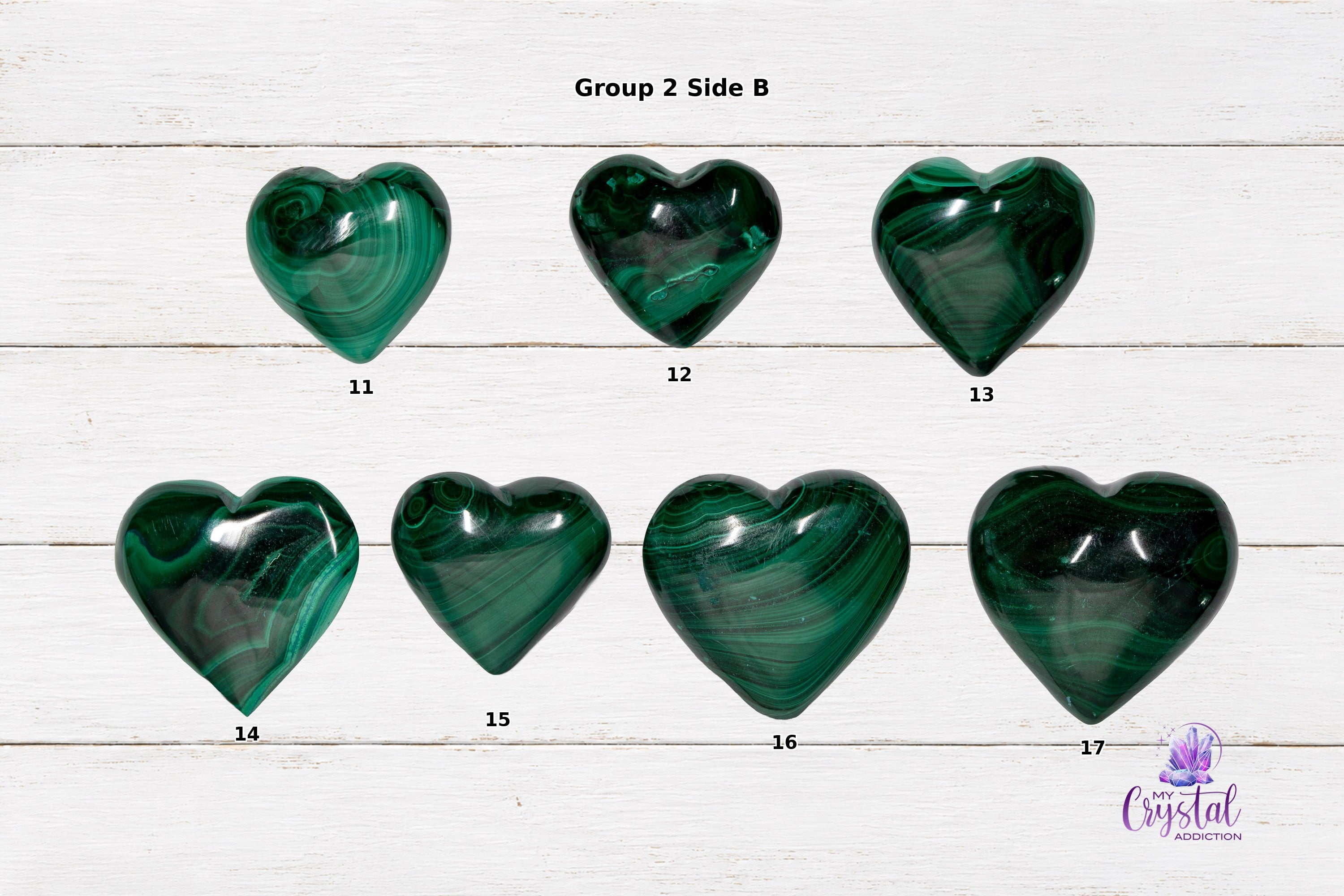 Alternate-side views of polished malachite heart carvings showing layered green banding.